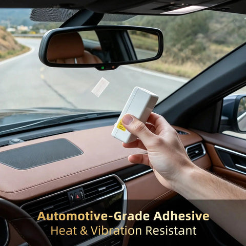 Person holding Heavy Duty Adhesive Mounting Strips For Ezpass Sunpass And Dash Cams in car interior with dashboard view.