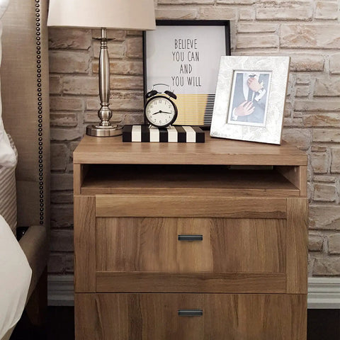 Wooden nightstand with lamp and photo frame, showcasing handles similar to 2 Inch Matte Black Cabinet Handles Set Stainless Steel Kitchen Cabinet Pulls Cupboard Hardware 10 Pack Go To Modern Durable Easy Install For Cabinets Wardrobes Dressers And More.