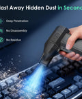 Cordless Air Duster With 110000 RPM Brushless Motor used on keyboard for dust removal, showing powerful airflow effect