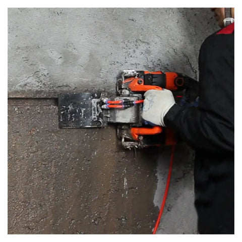 Badass 5200W Electric Wall Chaser cutting through concrete with laser tracking and adjustable depth settings.