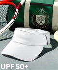 White sun visor hat with UV protection on gray surface, tennis racket, and green bag. Sun Visor Hat For Women And Men, UV Protection.