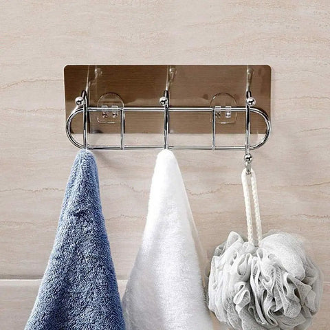 Heavy Duty Wall Mounted Adhesive Free Suction Hooks With Rock Solid Air Pressure Grip hang blue and white towels and a bath sponge.