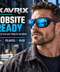 Boss Level Z87 Certified Safety Sunglasses Featuring Hardcore Removable Side Shields For Backcountry Hiking Skiing Kickass Uv Shielding And Crystal Clear Vision In Matte Blue Mirror Coating on a model with short hair and a black jacket.