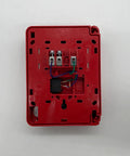 Back view of Kickass Addressable Pull Station For Tough Commercial Fire Alarm Systems, showing wiring connections and red plastic housing.