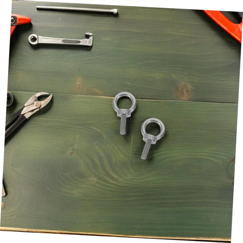 Stainless Steel Eyebolts With Closed Ring M6x20 For Heavy Duty Hanging, Beefy Load Bearing Eye Bolts With Washer And Nut, Concrete Or Wood Anchor Screws, Durable, Secure Mounts For Outdoor Gear Or Equipment, two M6 eyebolts on wood