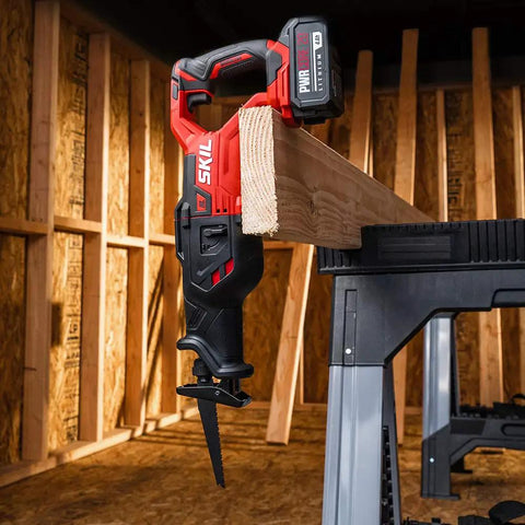 Cordless Reciprocating Saw Kit With Brushless 20V PWR CORE 20 Battery, 4.0Ah, cutting wood on a workbench in a workshop.