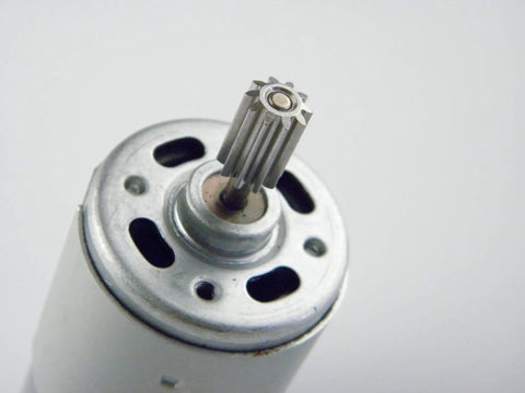 Close-up of High-Performance 550 12V DC Ride-On Car Motor Set for Kids 12000 RPM CW CCW showing metal shaft detail.