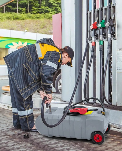Big 15 Gallon Portable Fuel Caddy With Easy Siphon Pump And Leak Proof Valves On Wheels for fueling at a gas station.