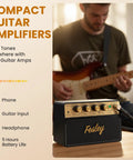Compact 10W Bluetooth Guitar Amp For Practice With Dual Clean And Distortion Channels Rechargeable Mini Amp in use