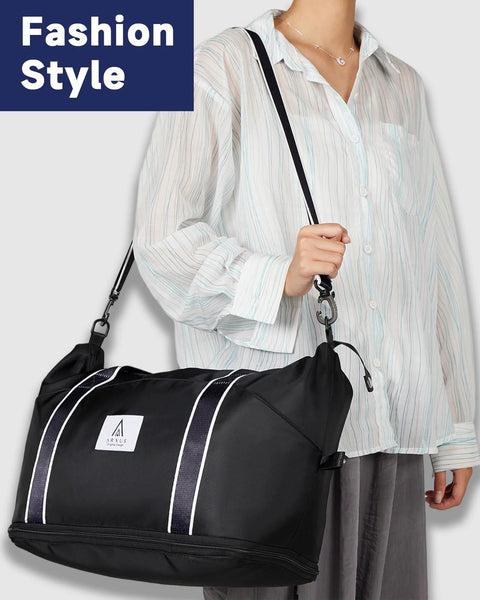 Arxus black rolling duffle bag with vertical white stripes, detachable shoulder strap, logo patch visible