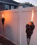 Skull Tiki Torch Set For Halloween Yard Decor, Handcrafted Skull Pattern Outdoor Lights, Weather Resistant Patio Lanterns, installed in garden
