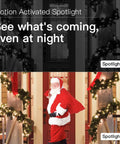 Plug And Play Light Bulb Security Camera 2K showing motion activated spotlight on at night with Santa in doorway