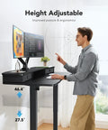 Electric Standing Desk With Two Drawers And Open Storage, 48 By 24 Inch Sit Stand Desk, C Clamp Mount Compatible, Height Adjustable in use