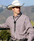 Man wearing Top Shelf Bolo Tie Set 8 Piece Adjustable Western Leather Neckties With Turquoise Conchos, stylish ranch look.