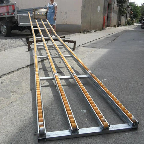 Unpowered Roller Conveyor For Bar Tank Beverage Unloading 30cm By 100cm spliced metal frame with yellow rollers outdoors
