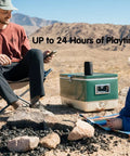 Compact Waterproof Portable Bluetooth Speaker That Goes Hard With Deep Bass, Dual Pairing, on a cooler during a desert outing
