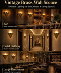QUOLM Vintage Bronze Wall Sconce, Scalloped Uplight Wall Lamp, E26 in a bar setting with warm glow ambiance.