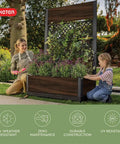 Outdoor Planter Box With Privacy Screen And Trellis 26 Gallon Raised Garden Bed For Climbing Plants And Flowers Wood Look Resin Built To Last Weather Resistant Divider For Patio Balcony And Backyard, showing two people gardening