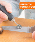 Person using Diamond Mounted Burrs for Carving and Polishing, Cylindrical Concave Diamond Drill Bits With 3/32 Inch Shank on a knife.