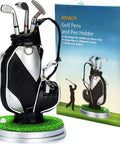 Mini Golf Pen Holder Desk Accessory Set with 3 Golf Club Pens and Ball on a Mini Putting Green Base next to packaging box.