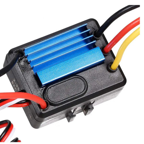 Close-up of 35A ESC for 3600KV 4Pole Sensorless Brushless RC Car Motor, blue aluminum heatsink, and wires for RC cars
