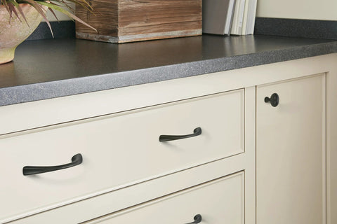 Vaile Matte Black Cabinet Pull 3-3/4 Inch Center to Center on cream kitchen drawer, contemporary style, smooth bold finish.