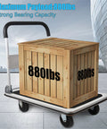 Heavy Duty Foldable Platform Truck with 880 lb capacity loading a wooden crate, large size utility cart for industrial and home use.