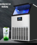Portable Countertop Ice Cube Maker With Quiet Self Cleaning System And Sleek Led Panel drops fresh crisp cubes fast next to a glass of mint drink.