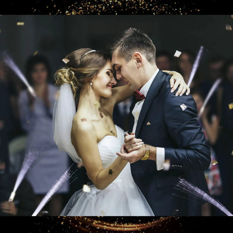 Bride and groom dancing with White Fiber Optic Wands Glow Sticks Light Up LED Sparklers For Weddings And Parties in background