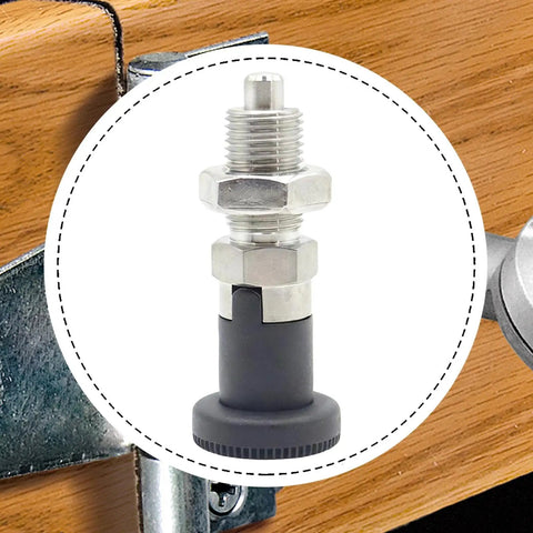 Top Shelf Stainless Steel Indexing Plunger With Easy Grab Nylon Handle And No Hassle Self Locking Design close-up on a workbench.