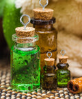 Glass jars with cork tops and eye screws from the 100 Piece Eye Bolts And Eye Screws Hooks Set For Hanging Crafts DIY Projects.