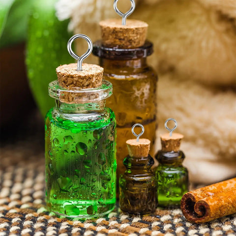 Glass jars with cork tops and eye screws from the 100 Piece Eye Bolts And Eye Screws Hooks Set For Hanging Crafts DIY Projects.