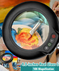 10X Real Glass Magnifying Glass With Light And Stand, 4.3 Inch Lens, showing painting in use, buttons visible, hands-free design