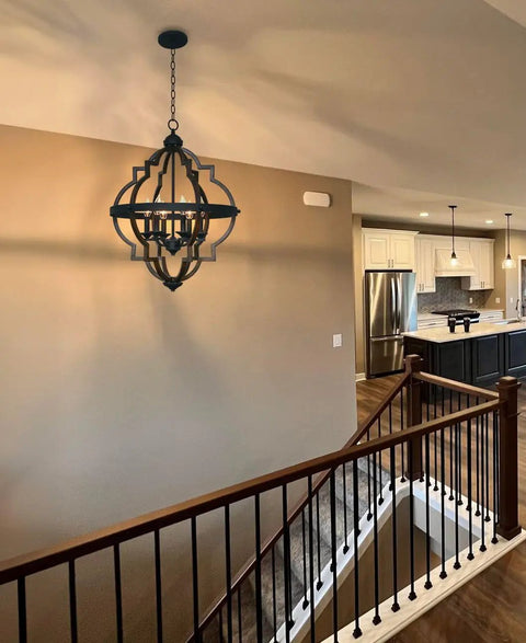 Six Light Rustic Farmhouse Chandelier With Walnut Wood Grain Metal Finish And Textured Black Accents in modern staircase