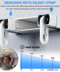 Close-up of ceiling mounted double row curtain track system with silent heavy duty pulleys and smooth sliding rails for curtains.