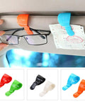 4 Piece Sunglasses Clip For Car Visor Universal Holder Multi Purpose Clip Card Pen Ticket Holder shown holding glasses and ticket