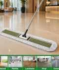 Heavy Duty Commercial Dust Mop And Floor Broom For Hardwood Surfaces With Secure Button Lock Handle and Wide Sweep Path in action on polished floor.