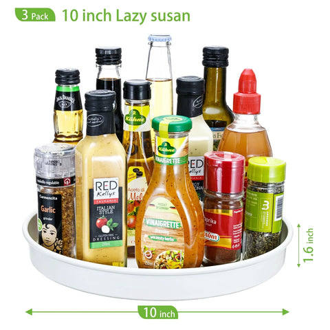 Front view of white 10-inch Lazy Susan turntable, 3-pack, with assorted condiment bottles on round tray