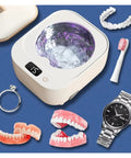 Slick White Ultrasonic Denture Washing Pod For Clear Retainers And Dainty Jewelry Fast Vibration Cycle with dental tools.