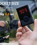 On The Go Portable Electric Mini Bike Pump With 130 PSI Gauge Auto Stop Digital Pressure Display in hand