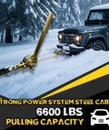 SENKEYFE come-along winch puller 3T with steel cable and gold finish, attached to a snow-covered vehicle