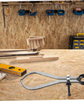 The Real Deal Heavy Duty Outside Caliper For Woodturning Precision Measuring Tool Built Tough Using Premium Carbon Steel, placed on a wooden workbench.