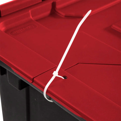 Close-up of tie down grommet on a tough 12 gallon storage tote lid for secure garage organization.
