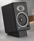 Angled Desktop Speaker Stands with Anti Slip Silicone Wedges for Medium Speakers, vibration resistant riser in use