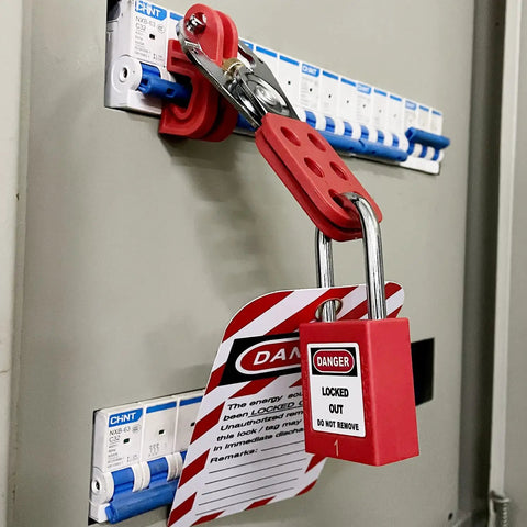 All In One Lockout Tagout Kit For Electrical Safety With Group Lockout Hasps, Lockout Tags, Numbered Padlocks, Nylon Ties And Red Pocket Bag installed on electric panel