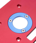 Premium Aluminum Router Table Insert Plate For Woodworking Benches Fits Rt0700c Router Trimmer Includes Heavy Duty Drill Chuck close-up showing red aluminum surface and blue insert ring.