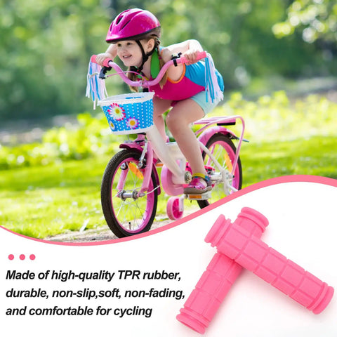 Child riding a pink bike with Non Slip Mushroom Style Bike Handlebar Grips For Kids And Grownups displayed beside in pink.