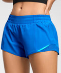 Close-up of Women's Low Rise 2.5 Inch Running Shorts With Built In Liner No Chafe Quick Dry Lightweight Gym Shorts Featuring Breathable Mesh Panels Curved Hems Wide Leg Openings Zip Pocket Blue showcasing the elastic waistband.
