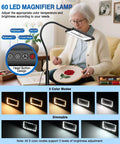 Elderly woman using Massive 7 Inch Floor Magnifier Lamp With Light And Stand Flexible Gooseneck 10X To 30X Magnification 5 Color Modes