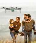 Foldable Camera Drone For Kids And Adults With Altitude Hold And Optical Flow Positioning flying above smiling family outdoors